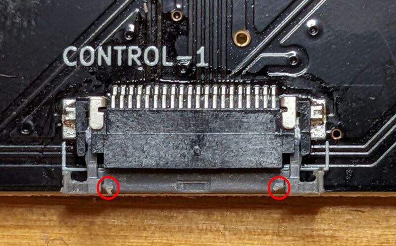 FPC-issue plastic bumps redcircles.jpg